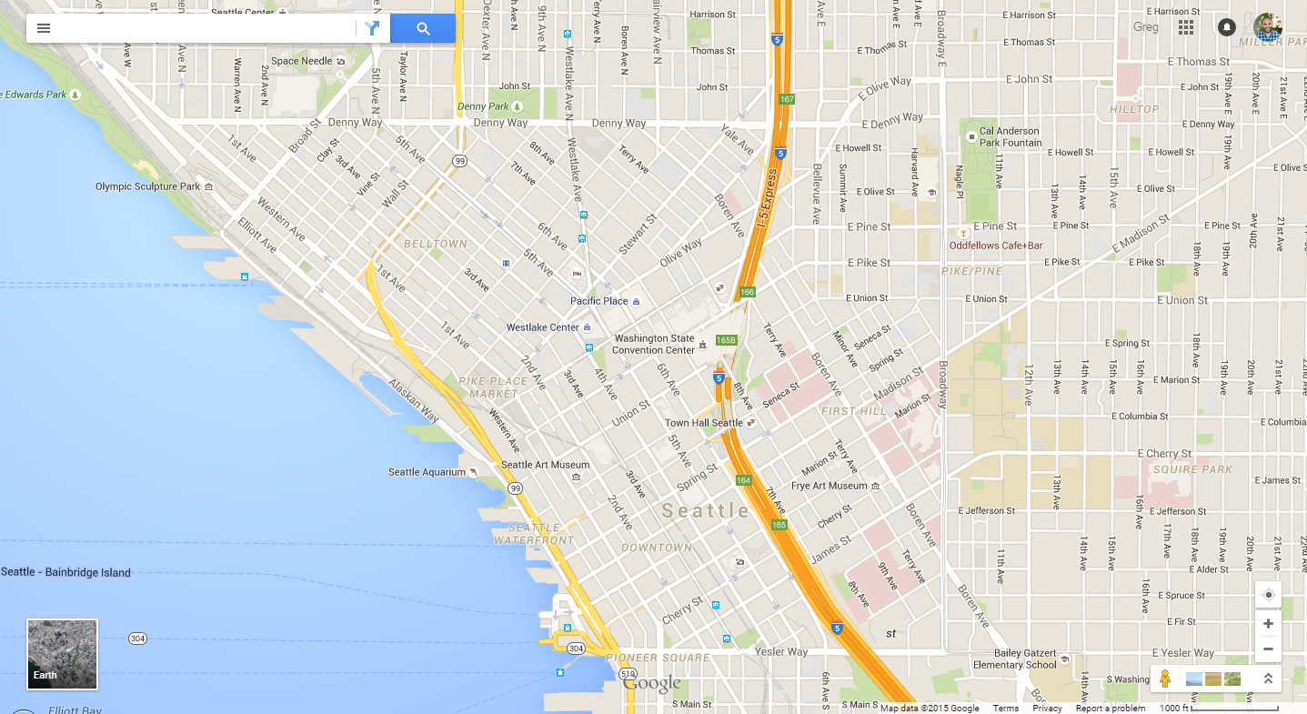 Screenshot of Google Maps for Seattle, including small icons for rail stops (but no differentiation between streetcar and light rail, despite their vastly different service); also, streetcar stops are shown while RapidRide bus stops are not